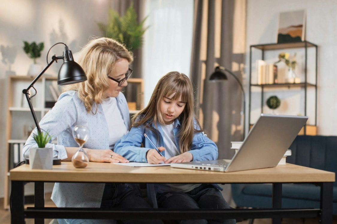 parent-mom-teaching-teenage-school-child-distance-learning-online-virtual-class-on-computer-